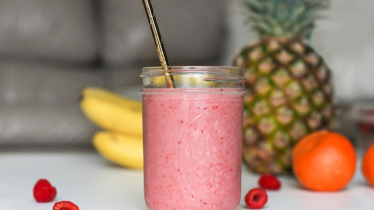 pink fruit shake in jar